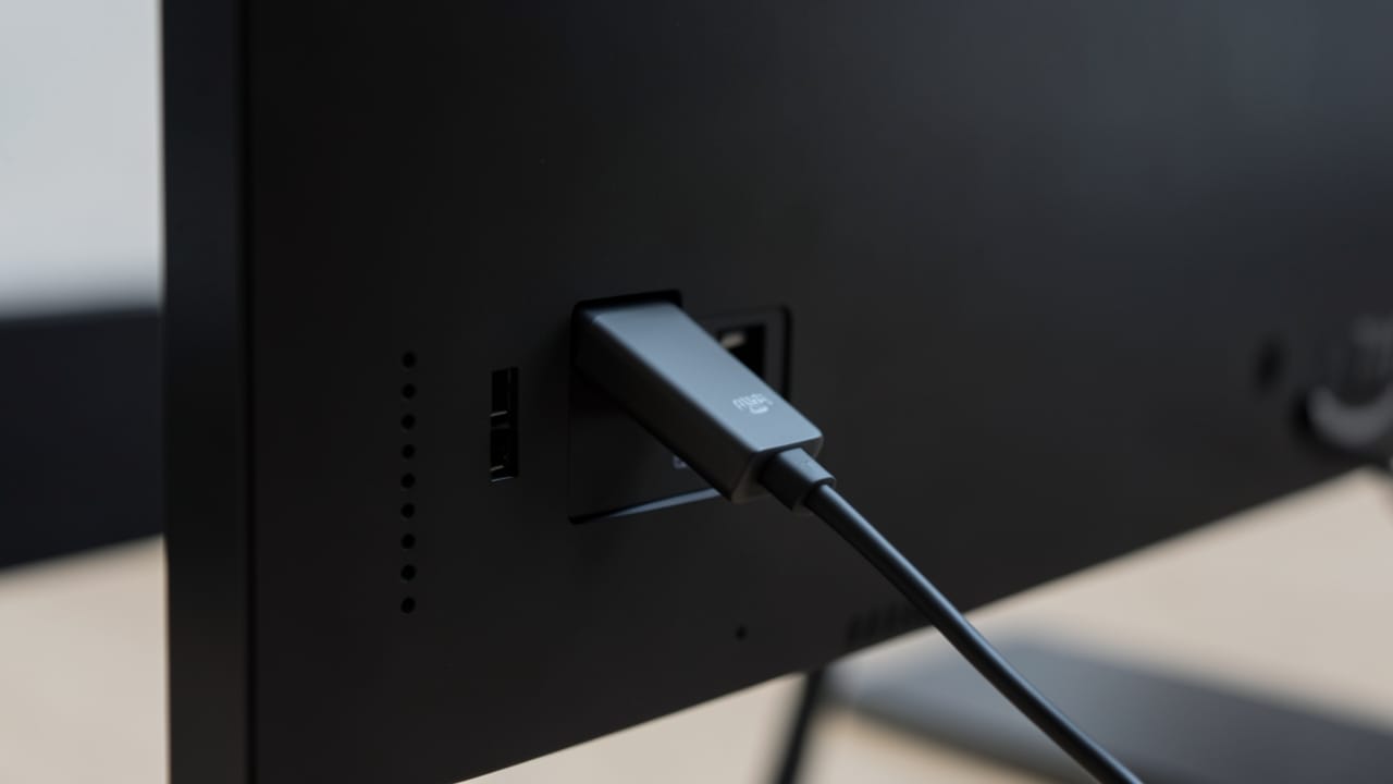 New Amazon Fire TV Stick HD plugged into TV's USB port, reducing cable clutter. New Amazon Fire TV Stick HD plugged into TV's USB port, reducing cable clutter.